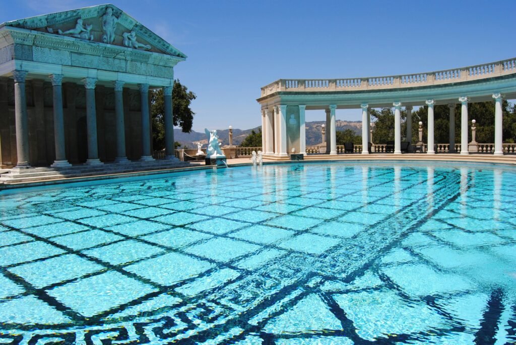 people in swimming pool during daytime